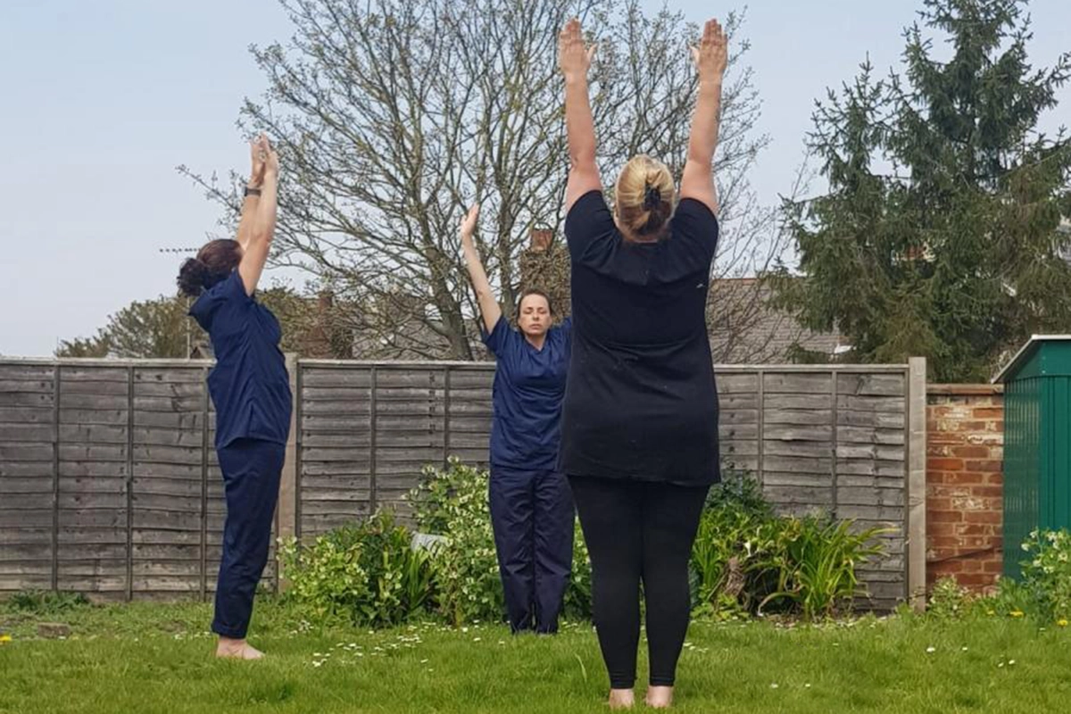 Image of Staff doing yoga